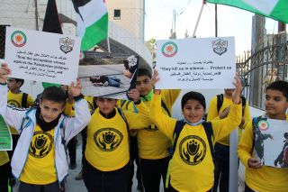 أشبال وزهرات فلسطين يطالبون بحماية دولية
